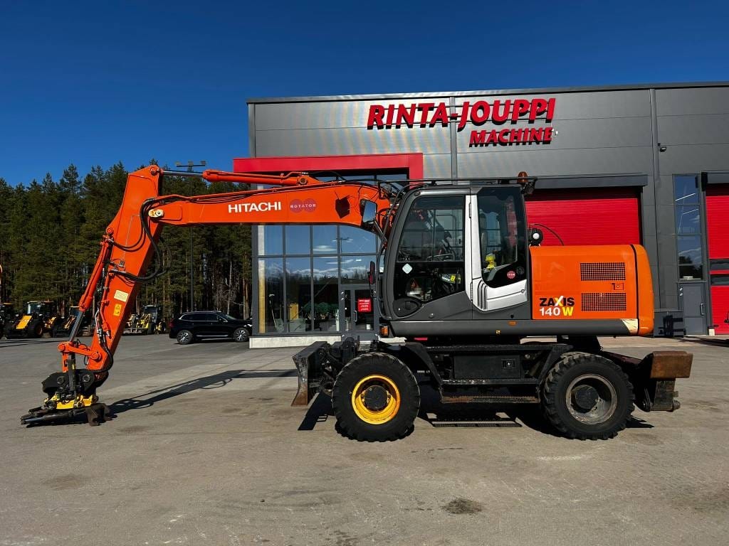 hitachi-zx-140-w-3-vahan-